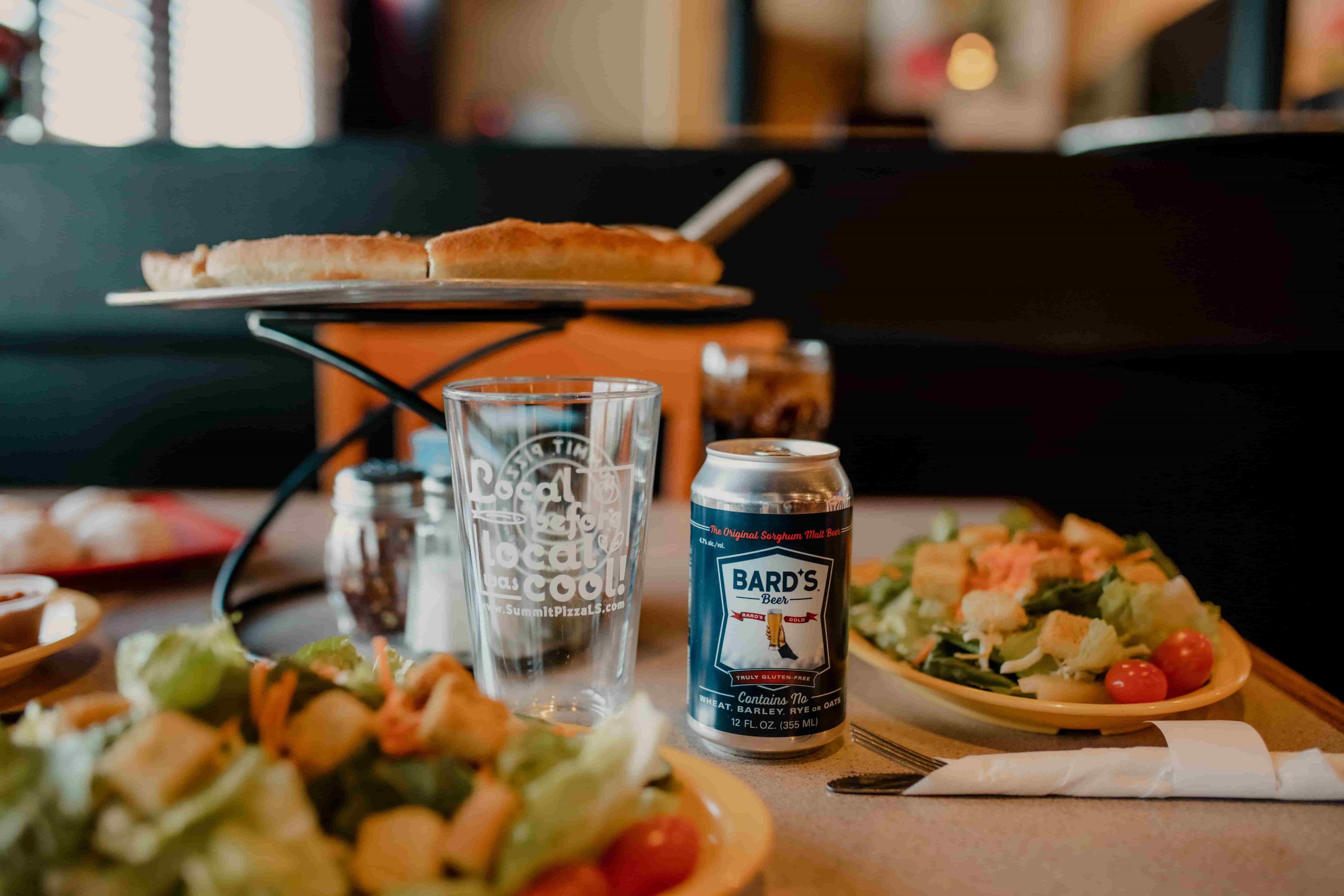 table of food, drinks and salads