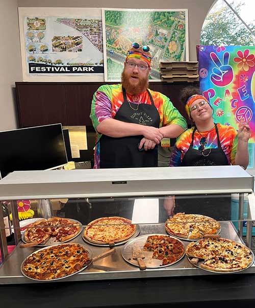 Staff in their tie-dye at a catering event